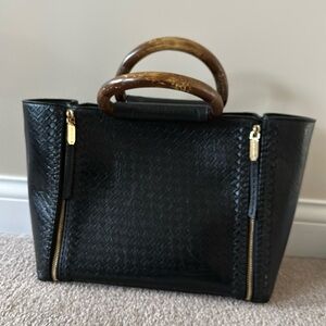 Henri Bendel black leather purse with wooden handles